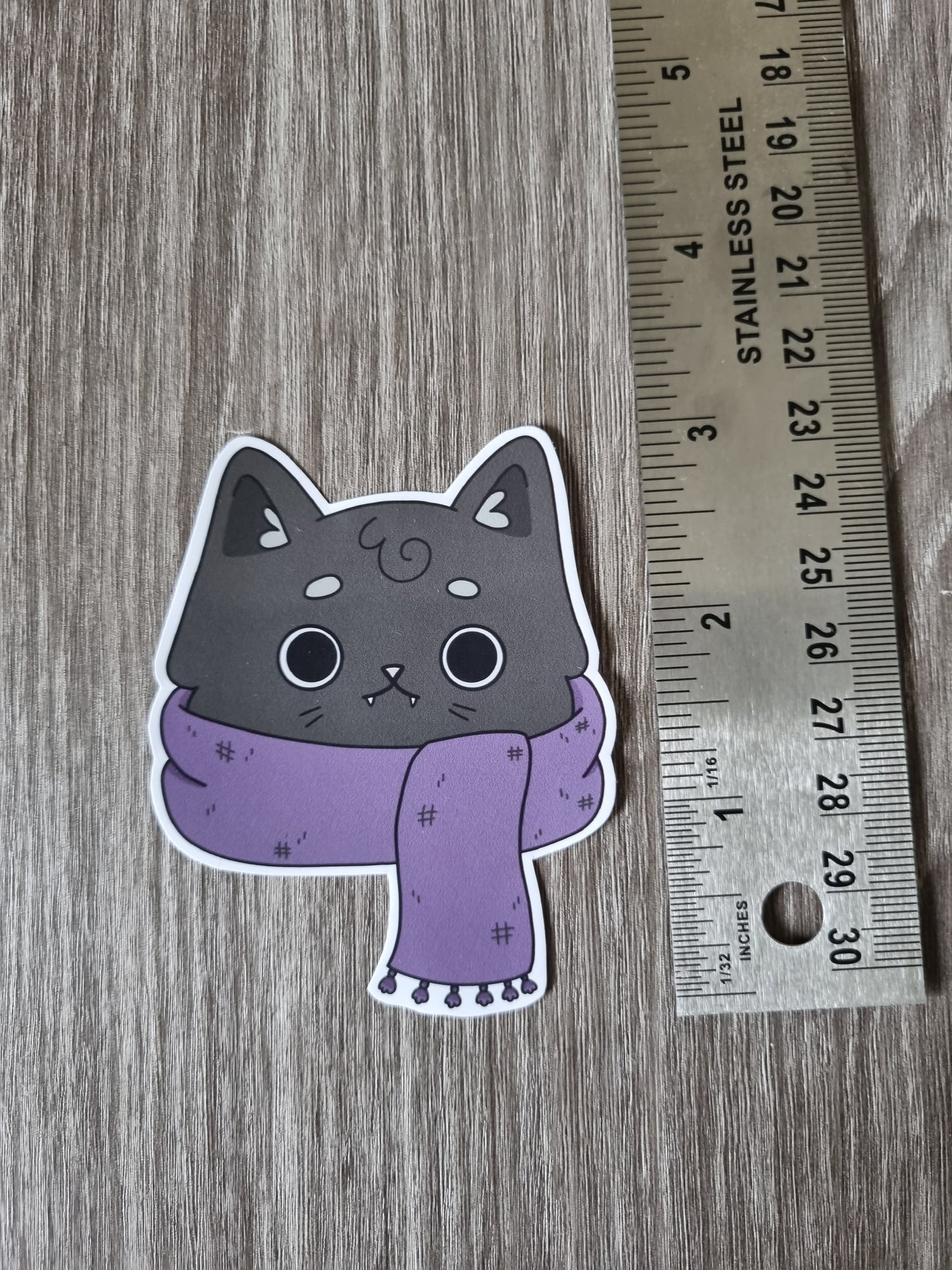 Cute cozy black cat sticker, autumnal spooky scarf cat sticker for laptops, journals and notebooks