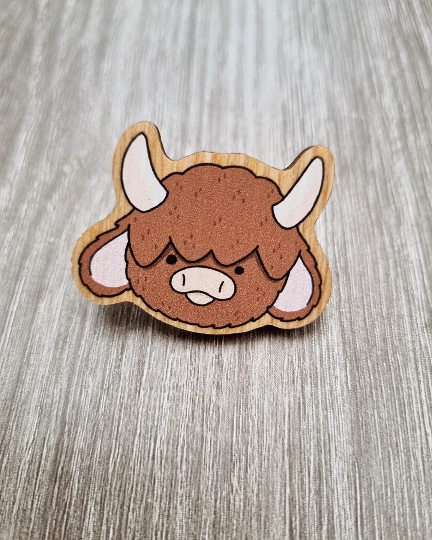 Cute brown fluffy horned cow pin, wooden highland cow pin badge